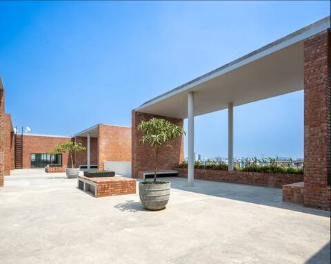 1BR Studio with Rooftop Access Image 1