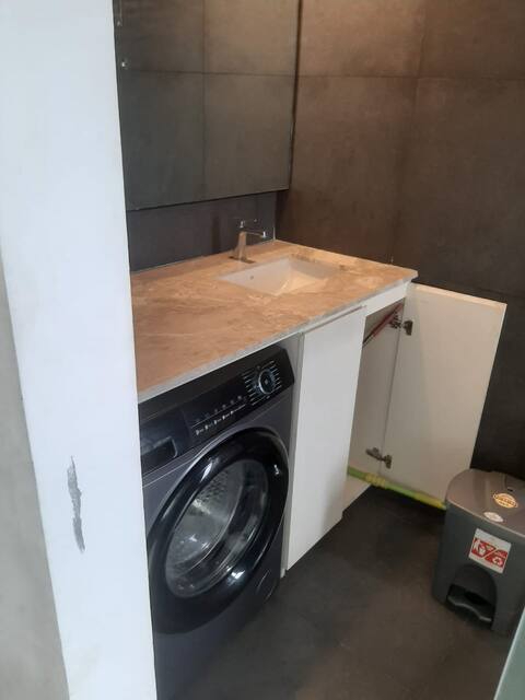 1BR Studio with Rooftop Access Image 10